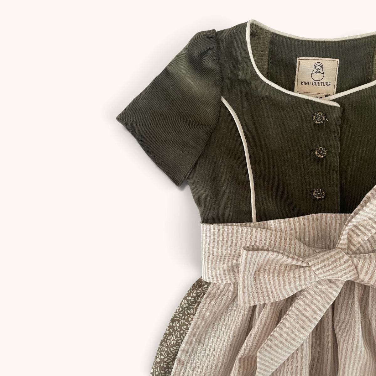 Oberteil von Dirndl Grete mit heller Paspelierung und gestreifter Schürze